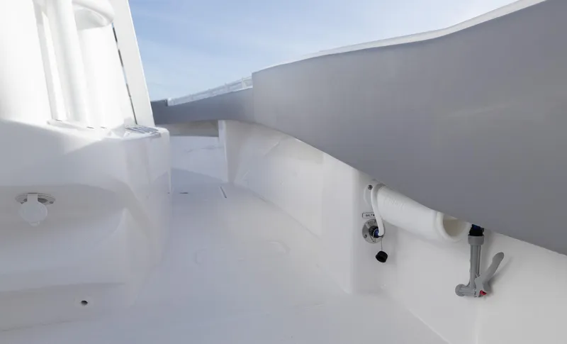  Yacht Photos Pics 2025 Invincible 33 Open Fisherman boat interior, sleek white and gray design.