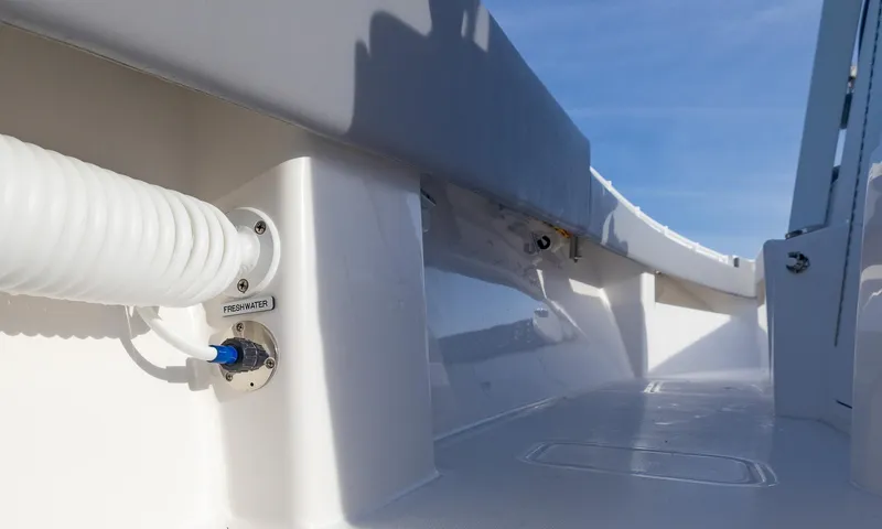  Yacht Photos Pics 2025 Invincible 33 Open Fisherman boat interior, featuring sleek white design and modern fittings.