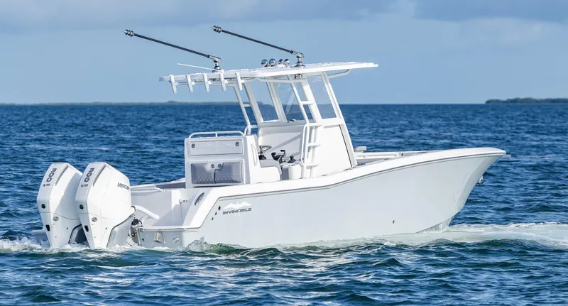  Yacht Photos Pics 2025 Invincible 33 Open Fisherman boat cruising on open water.