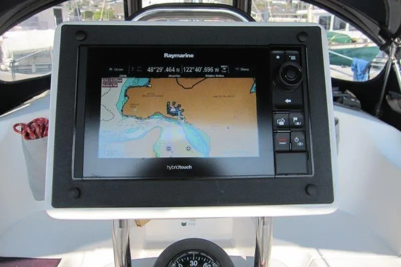 Sassy Cat Yacht Photos Pics Raymarine navigation system on 2004 Catalina 350 MkII sailboat, displaying nautical chart.