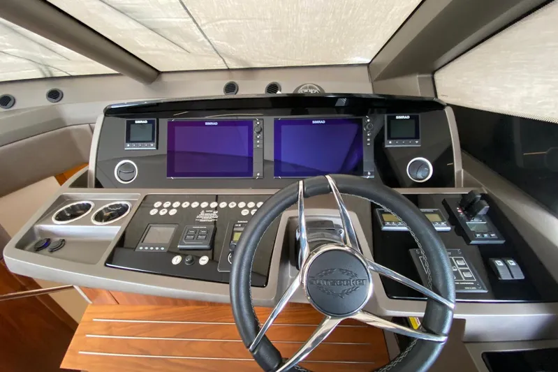  Yacht Photos Pics Control panel of 2017 Sunseeker Manhattan 52 yacht with advanced navigation systems.