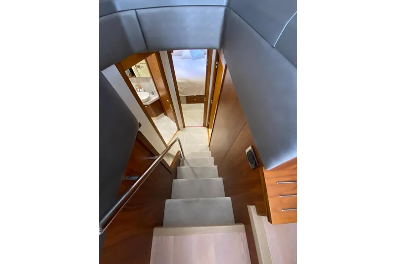  Yacht Photos Pics Staircase inside 2017 Sunseeker Manhattan 52 yacht, leading to lower cabin area.