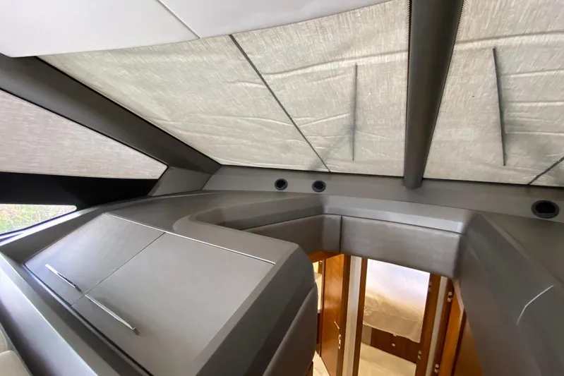  Yacht Photos Pics Interior view of 2017 Sunseeker Manhattan 52 yacht, featuring sleek cabinetry and modern design.