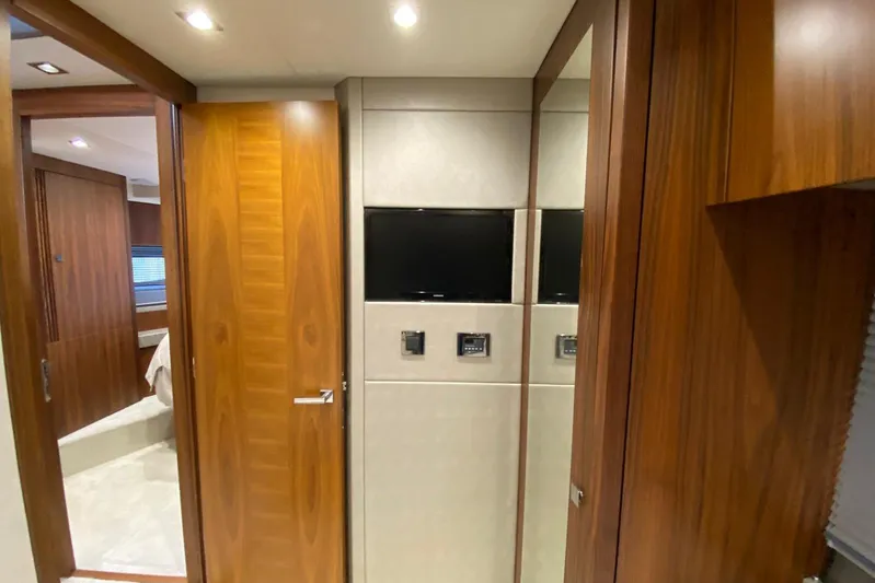  Yacht Photos Pics Interior of 2017 Sunseeker Manhattan 52 yacht with wooden doors and modern design.