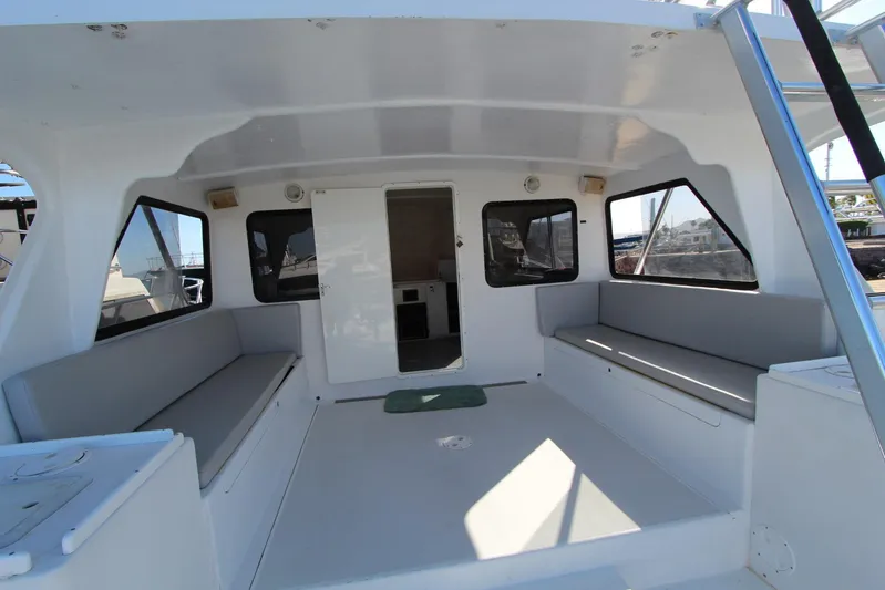 Pure Magic Yacht Photos Pics 2006 Island Hopper Sportfisher boat interior with seating and windows.