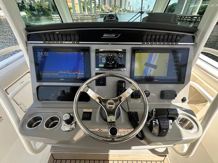  Yacht Photos Pics 2017 Boston Whaler 350 Outrage helm with advanced navigation displays and controls.