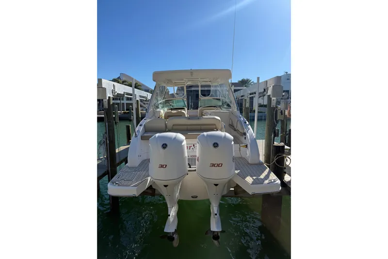  Yacht Photos Pics 2018 Regal 33 OBX boat docked with twin 300 horsepower engines.