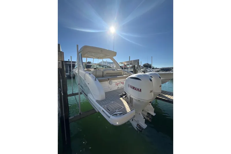  Yacht Photos Pics 2018 Regal 33 OBX boat with Yamaha engines docked under bright sun.