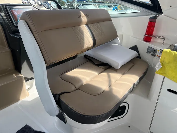  Yacht Photos Pics 2016 Sea Ray 310 Sundancer cockpit with tan seating and control panel.