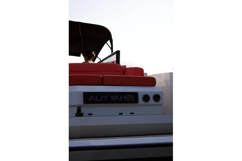 Aliyyah 29 Yacht Photos Pics 2018 Vanquish Yachts VQ45 with red seating and canopy, rear view.