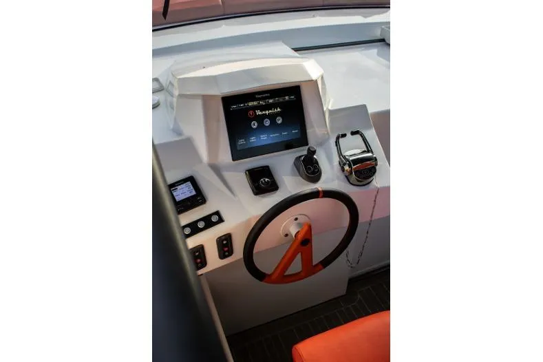 Aliyyah 29 Yacht Photos Pics Cockpit of 2018 Vanquish Yachts VQ45 with modern controls and touchscreen display.