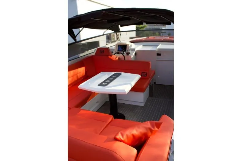 Aliyyah 29 Yacht Photos Pics Luxurious 2018 Vanquish Yachts VQ45 interior with vibrant orange seating and sleek design.