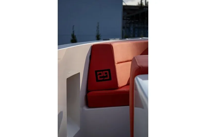 Aliyyah 29 Yacht Photos Pics Red seating on 2018 Vanquish Yachts VQ45 boat, featuring modern design elements.