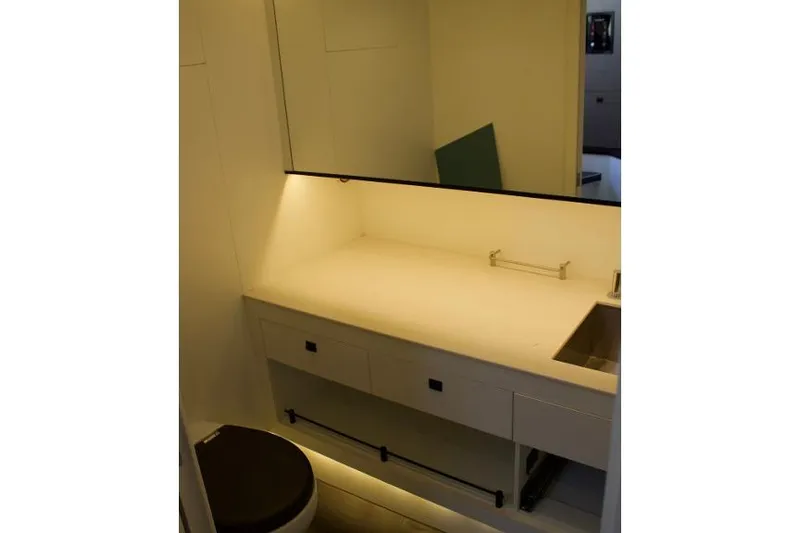 Aliyyah 29 Yacht Photos Pics Luxurious bathroom interior of 2018 Vanquish Yachts VQ45 with modern fixtures.