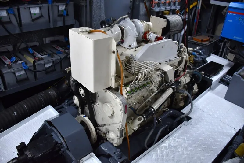 Risk Taker Yacht Photos Pics Engine room of 2006 Tansu Custom Trawler, showcasing detailed machinery and components.