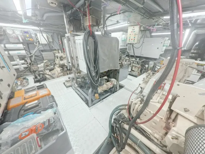 Risk Taker Yacht Photos Pics Engine room of 2006 Tansu Custom Trawler with machinery and control panels.