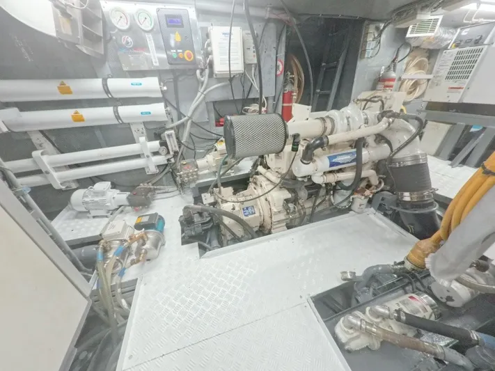 Risk Taker Yacht Photos Pics Engine room of 2006 Tansu Custom Trawler with visible machinery and control panels.