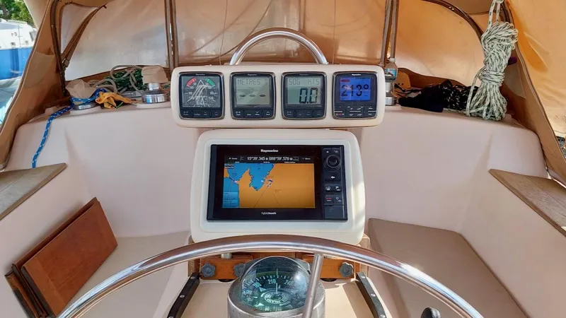 Azafran Yacht Photos Pics Cockpit of 1994 Island Packet 40 sailboat with navigation instruments and compass.