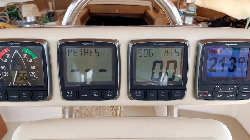 Azafran Yacht Photos Pics 1994 Island Packet 40 sailboat dashboard with Raymarine instruments displaying navigation data.