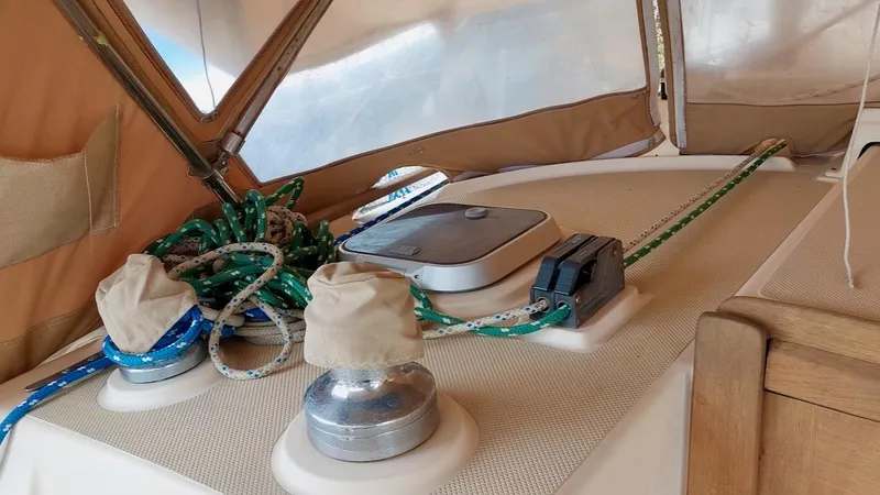 Azafran Yacht Photos Pics 1994 Island Packet 40 sailboat deck with winches, ropes, and hatch.