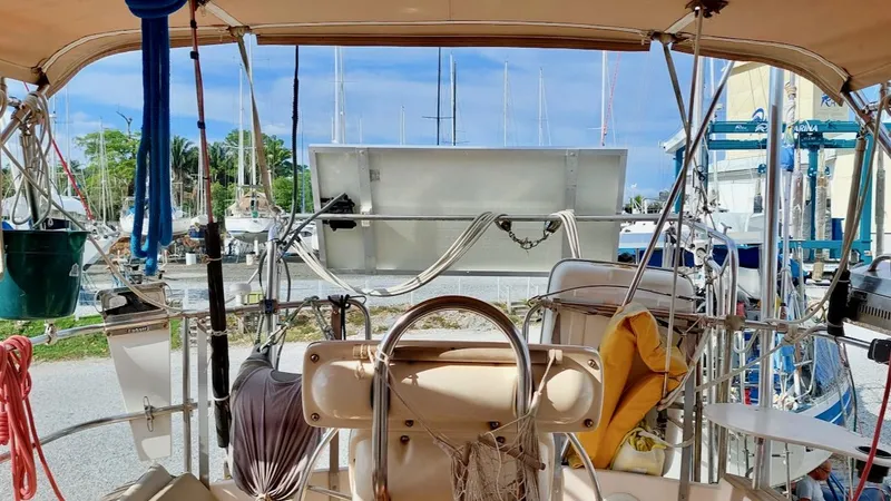 Azafran Yacht Photos Pics Cockpit view of a 1994 Island Packet 40 sailboat in a marina setting.