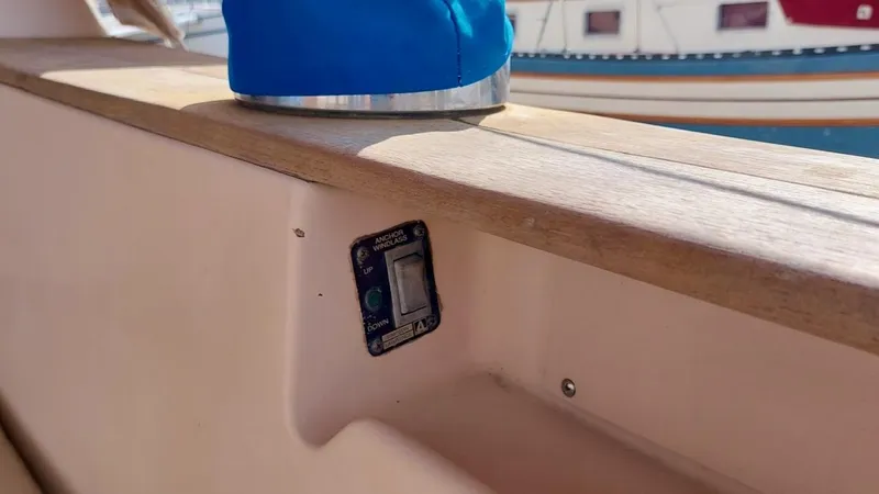 Azafran Yacht Photos Pics Close-up of a 1994 Island Packet 40 sailboat deck detail with a switch.