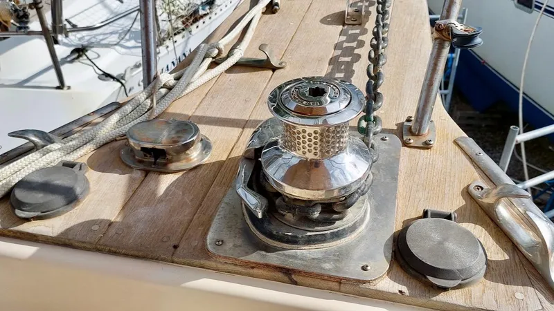 Azafran Yacht Photos Pics Deck of 1994 Island Packet 40 sailboat with winch and anchor chain.