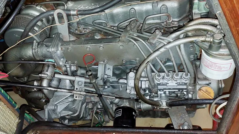 Azafran Yacht Photos Pics Engine of a 1994 Island Packet 40 sailboat, showcasing mechanical components and wiring.