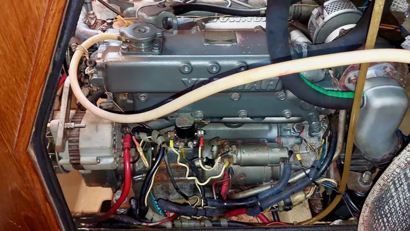 Azafran Yacht Photos Pics Engine compartment of a 1994 Island Packet 40 sailboat, showcasing detailed wiring and components.