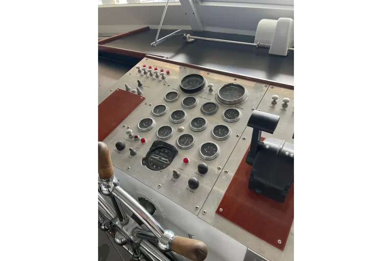 Georgia Yacht Photos Pics 1967 Huckins Offshore yacht control panel with gauges and levers.