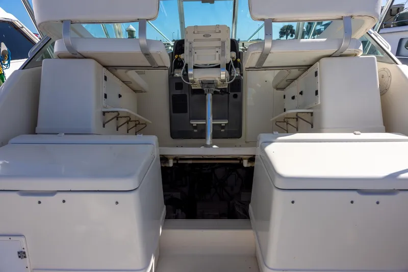  Yacht Photos Pics 1997 Tiara Yachts 3500 Express cockpit with seating and helm controls.