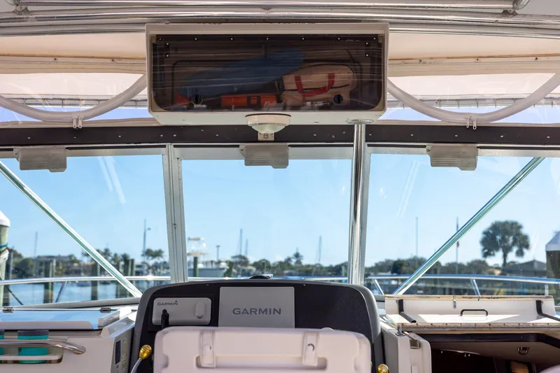  Yacht Photos Pics Interior view of 1997 Tiara Yachts 3500 Express with Garmin navigation system.