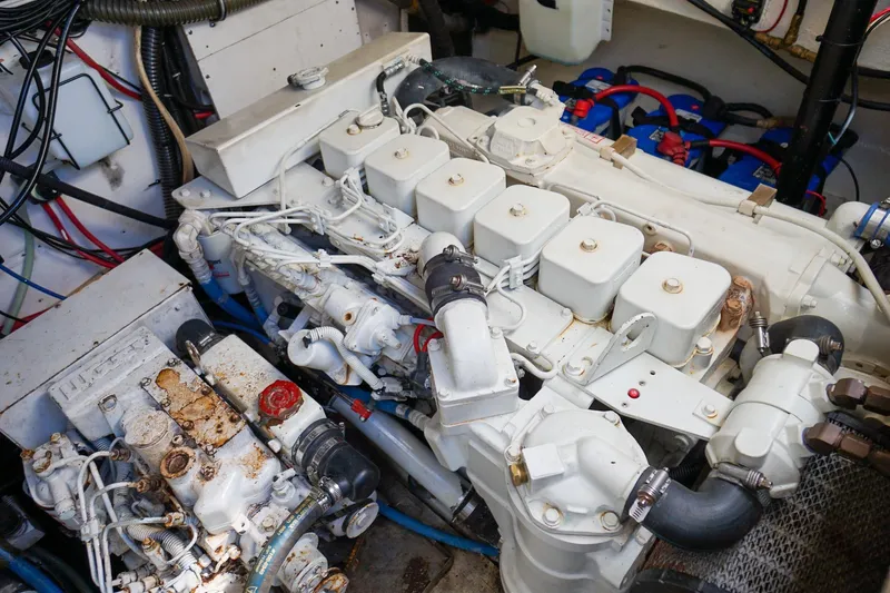  Yacht Photos Pics Engine room of a 1997 Tiara Yachts 3500 Express, showcasing mechanical components.