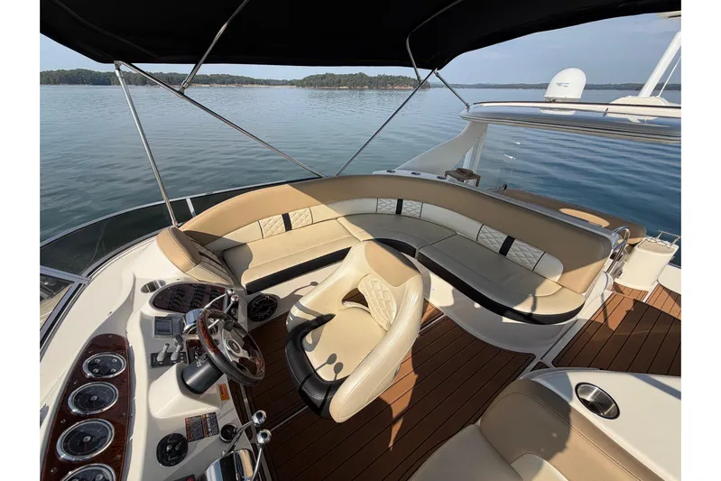 This Bar Yacht Photos Pics Luxurious 2004 Meridian 459 Motoryacht interior with elegant seating and steering area.