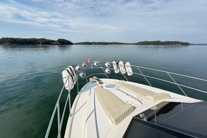 This Bar Yacht Photos Pics 2004 Meridian 459 Motoryacht cruising on calm waters with scenic island views.