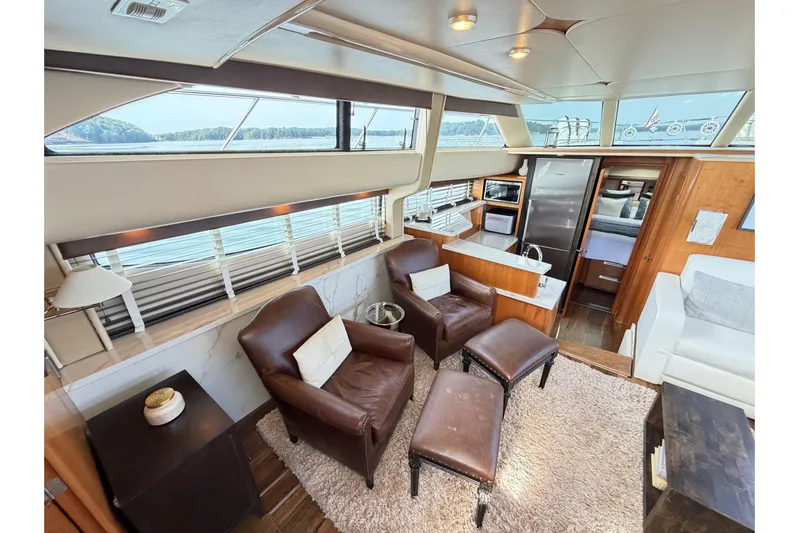 This Bar Yacht Photos Pics Luxurious interior of 2004 Meridian 459 Motoryacht with leather seating and modern amenities.