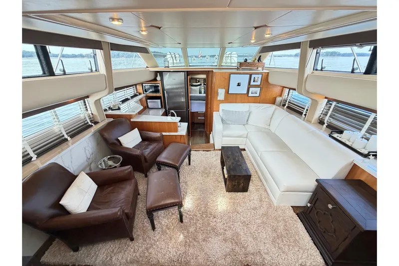 This Bar Yacht Photos Pics Luxurious interior of 2004 Meridian 459 Motoryacht with leather seating and modern amenities.