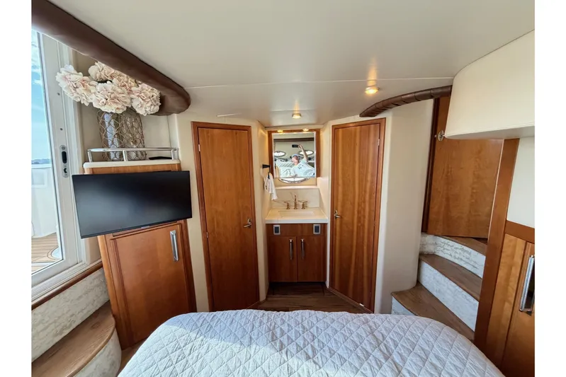 This Bar Yacht Photos Pics Luxurious interior of 2004 Meridian 459 Motoryacht with wood finishes and modern amenities.