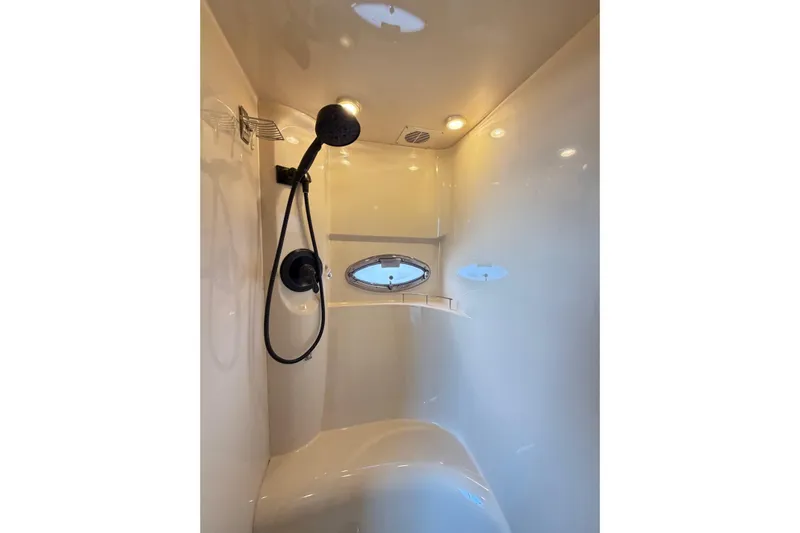 This Bar Yacht Photos Pics Shower area in 2004 Meridian 459 Motoryacht with modern fixtures and lighting.