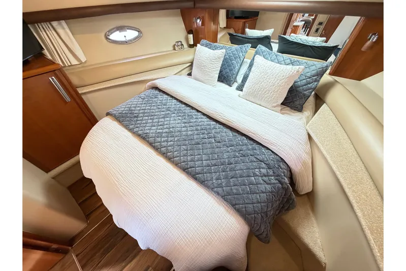 This Bar Yacht Photos Pics Luxurious bedroom interior of 2004 Meridian 459 Motoryacht with elegant bedding.