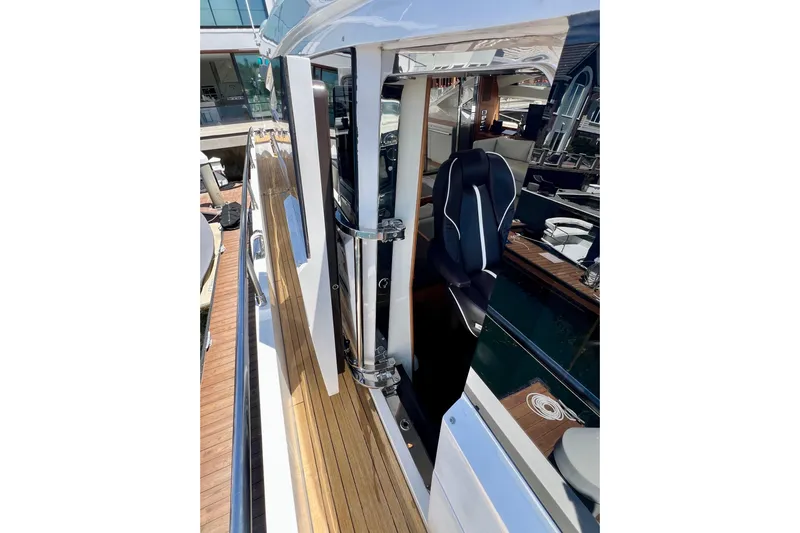  Yacht Photos Pics 2010 Princess V78 yacht with sleek deck and modern seating.