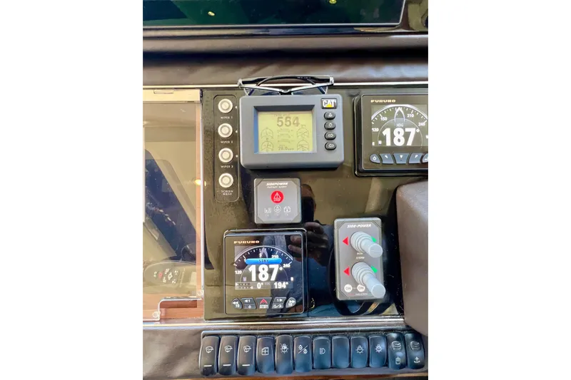  Yacht Photos Pics Control panel of a 2010 Princess V78 yacht with navigation instruments.