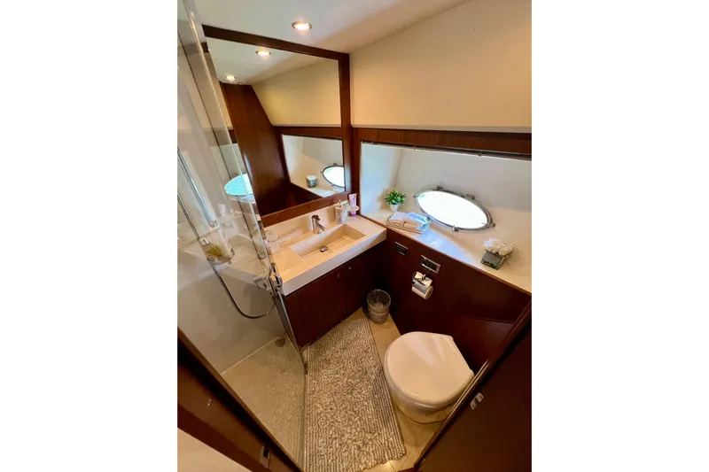  Yacht Photos Pics Luxurious bathroom in 2010 Princess V78 yacht with modern fixtures and elegant design.