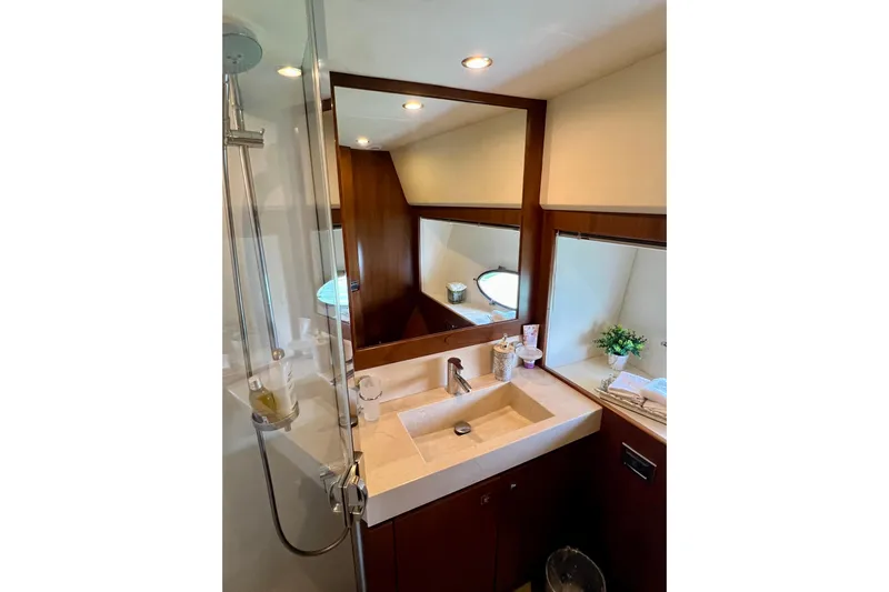  Yacht Photos Pics Luxurious bathroom in 2010 Princess V78 yacht with modern fixtures and elegant design.