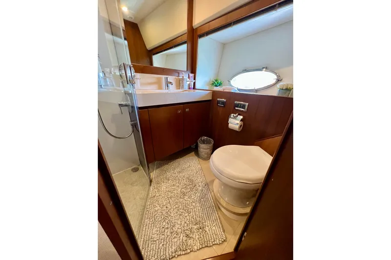  Yacht Photos Pics Luxurious bathroom in 2010 Princess V78 yacht with modern fixtures and elegant design.