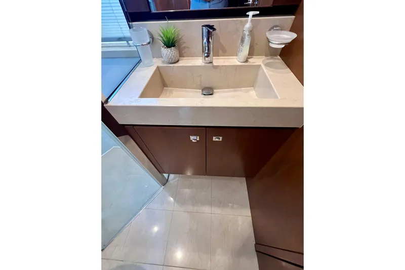  Yacht Photos Pics Luxury yacht bathroom sink on 2010 Princess V78, featuring modern fixtures and elegant design.