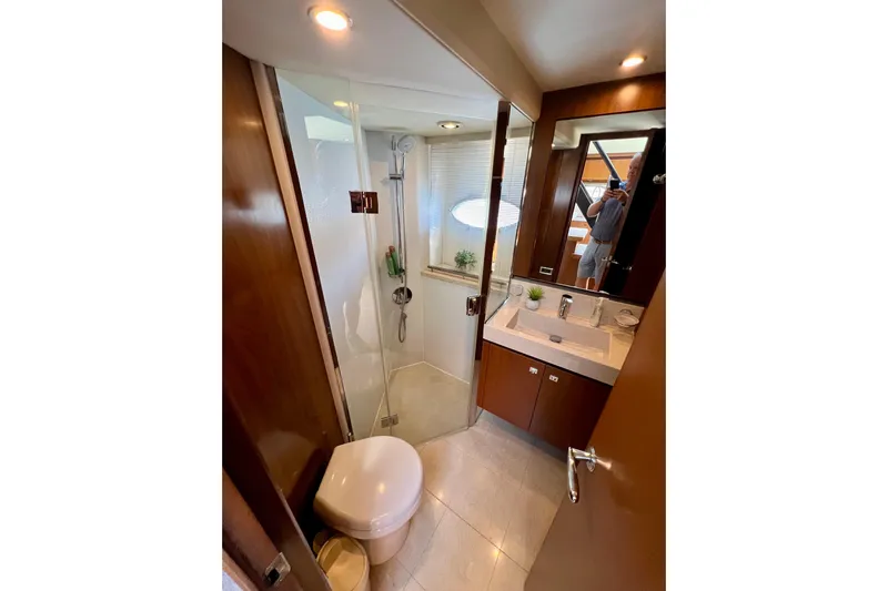  Yacht Photos Pics Luxurious bathroom in 2010 Princess V78 yacht with modern fixtures and elegant design.