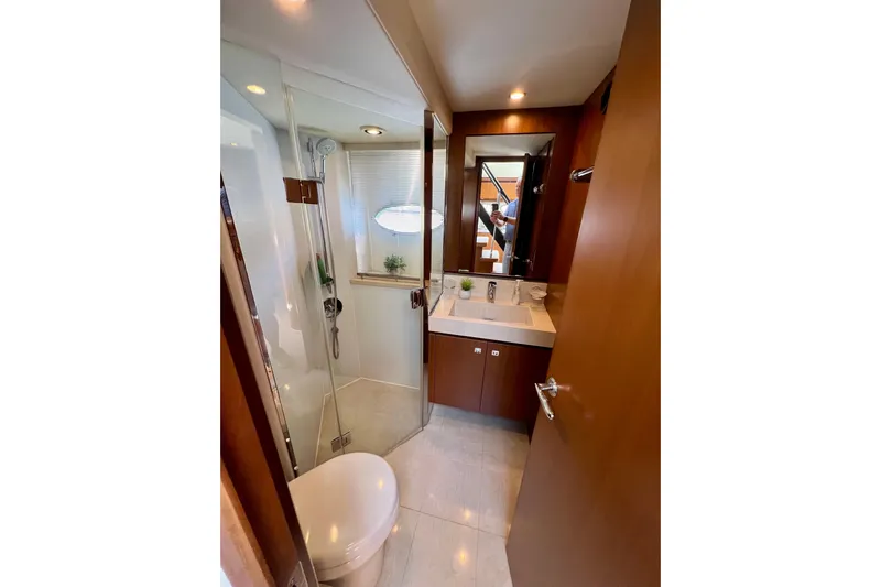  Yacht Photos Pics Luxurious bathroom in 2010 Princess V78 yacht with modern fixtures and elegant design.