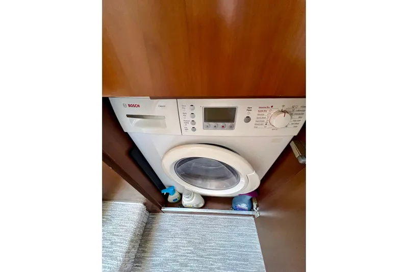  Yacht Photos Pics Bosch washing machine in a 2010 Princess V78 yacht interior.