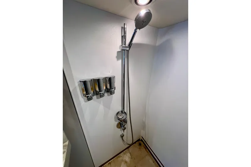  Yacht Photos Pics Shower area in 2010 Princess V78 yacht with chrome fixtures and dispensers.